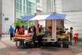 Mobile vendor sell fast food on a street