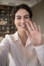 Mobile web camera view young Hispanic woman starting video call. Royalty Free Stock Photo