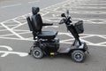 Mobility Scooter in a Car Park Royalty Free Stock Photo