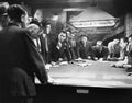 Mobsters meeting around pool table Royalty Free Stock Photo