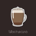 Mocachino coffee with whipped milk and grated chocolate in a glass cup