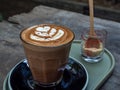 Mocha coffee on wooden table background Royalty Free Stock Photo