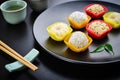 Mochi assortment on plate with chopticks Royalty Free Stock Photo