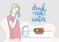 Young woman drinking water from glass. Drink more Water. Lifestyle and healthcare concept