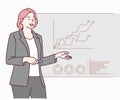 Confident business woman uses interactive screen makes report to a group of meeting, she shows statistics, growth and analysis