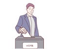 A Man voter putting ballot into voting box. Democracy freedom concept. Royalty Free Stock Photo