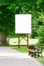Mock up. Blank billboard outdoors, outdoor advertising, public information board in the city park Royalty Free Stock Photo