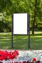 Mock up. Blank billboard outdoors, outdoor advertising, public information board in the city park Royalty Free Stock Photo