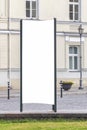 Mock up. Blank outdoor advertising column outdoors, public information board in the street. Royalty Free Stock Photo