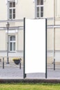 Mock up. Blank outdoor advertising column outdoors, public information board in the street. Royalty Free Stock Photo