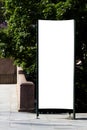 Mock up. Blank outdoor advertising column outdoors, public information board in the street. Royalty Free Stock Photo