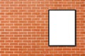 Mock up blank poster picture frame hanging on red brick wall background in room - can be used mock up for montage products display Royalty Free Stock Photo