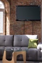 Mock up blank television screen on the brick wall background