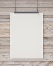 Mock up blank white hanging poster on horizontal wooden planks wall, background Royalty Free Stock Photo