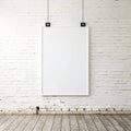 Mock up blank white hanging poster on white wall background Royalty Free Stock Photo