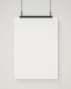 Mock up blank white hanging poster on white wall, background