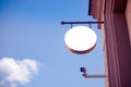 Mock up. Empty round signboard on classical architecture building. Royalty Free Stock Photo