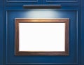 Mock up Blank Wooden Frame on blue wall with spot light Interior Royalty Free Stock Photo