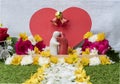 Mock up couple hugging at a simulated wedding decorated with roses and flowers. Valentine day concept