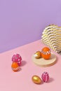 Mock up creative Easter composition. Colorful eggs with glamour gems decor on pink table. Trendy minimal design Royalty Free Stock Photo