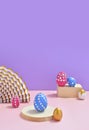 Mock up creative Easter composition. Colorful eggs with glamour gems decor, podiums on pink table. Royalty Free Stock Photo