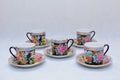 Mock up / design set of elegant and traditional colorful coffee cup & Tea cup on cup`s plate , drink-ware , kitchen isolated on wh