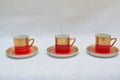 Mock up / design set of elegant and traditional colorful Red and gold traditional elegant coffee cup & Tea cup on cup`s plate besi Royalty Free Stock Photo