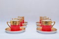 Mock up / design set of elegant and traditional colorful Red and gold traditional elegant coffee cup & Tea cup on cup`s plate besi Royalty Free Stock Photo