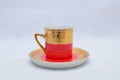 Mock up / design set of elegant and traditional colorful Red and gold traditional elegant coffee cup & Tea cup on cup`s plate besi Royalty Free Stock Photo