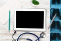 Mock up of doctors desktop with medical supplies Royalty Free Stock Photo