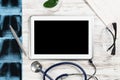 Mock up of doctors desktop with medical supplies Royalty Free Stock Photo