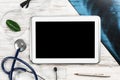 Mock up of doctors desktop with medical supplies Royalty Free Stock Photo