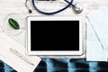 Mock up of doctors desktop with medical supplies Royalty Free Stock Photo