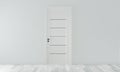 Mock up door on empty room white wall on white wooden floor.3D rendering Royalty Free Stock Photo