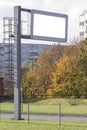 Mock up. Electronic scoreboard over road in the city street