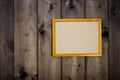 Mock up empty wooden picture frame on dark pine wood wall background, show text or product Royalty Free Stock Photo