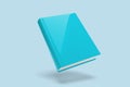 Mock up of a floating book on a color background - 3d rendering Royalty Free Stock Photo