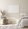 Mock up frame in bedroom interior background, beige room with natural wooden furniture Royalty Free Stock Photo