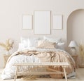 Mock up frame in bedroom interior background, beige room with natural wooden furniture Royalty Free Stock Photo