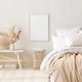 Mock up frame in bedroom interior background, beige room with natural wooden furniture Royalty Free Stock Photo