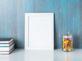 Mock up frame on blue wooden wall Royalty Free Stock Photo