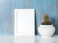 Mock up frame on blue wooden wall Royalty Free Stock Photo