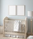 Mock up frame in boy nursery with natural wooden furniture Royalty Free Stock Photo