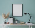 Mock up frame in bright farmhouse interior background, white wooden office on blue wall Royalty Free Stock Photo