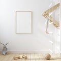 Mock up frame in children room with natural wooden furniture, Scandinavian style interior background Royalty Free Stock Photo