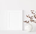 Mock up frame close up in home interior background with plant in vase