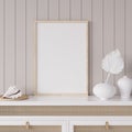 Mock up frame in coastal home interior background, room with natural wooden furniture and dry plants Royalty Free Stock Photo