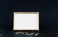 Mock up frame on dark background with Christmas decorations stars confetti. Invitation, card, paper. Place for text Trendy black a