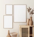 Mock up frame in home interior with rattan furniture, Scandi-boho style Royalty Free Stock Photo