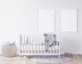 Mock up frame in newborn bedroom, two white frames on gray background interior